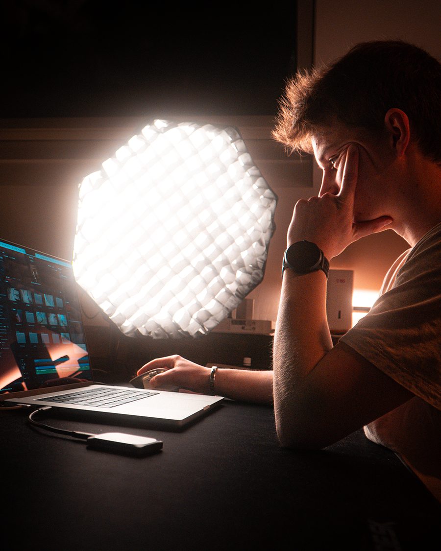Dima editing at his desk at night